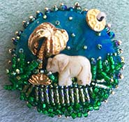 Elephant beaded fabric button