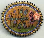 dragonfly button on gourd